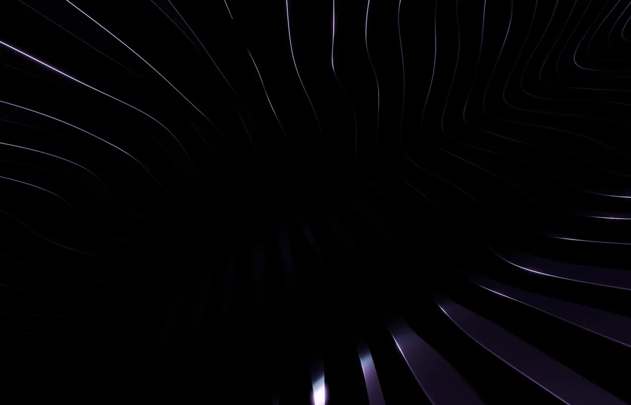 Abstract dark swirling lines in purple and blue, suggesting a repeating rhythm