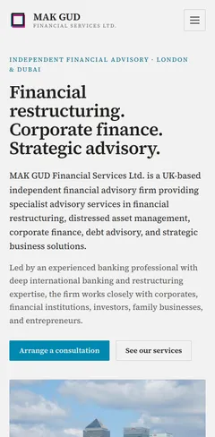 MAK GUD Financial Services on a phone